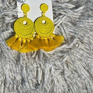 Yellow‎ earrings.